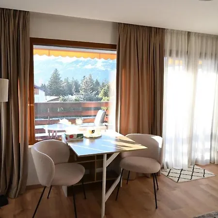 Crans Montana-snow Island Lens